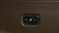 The side panel of the captain's chair in the Toyota Sienna van has swivel and rail shortcut buttons
